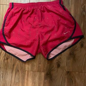 pink dotted nike shorts. youth xl fits like AS